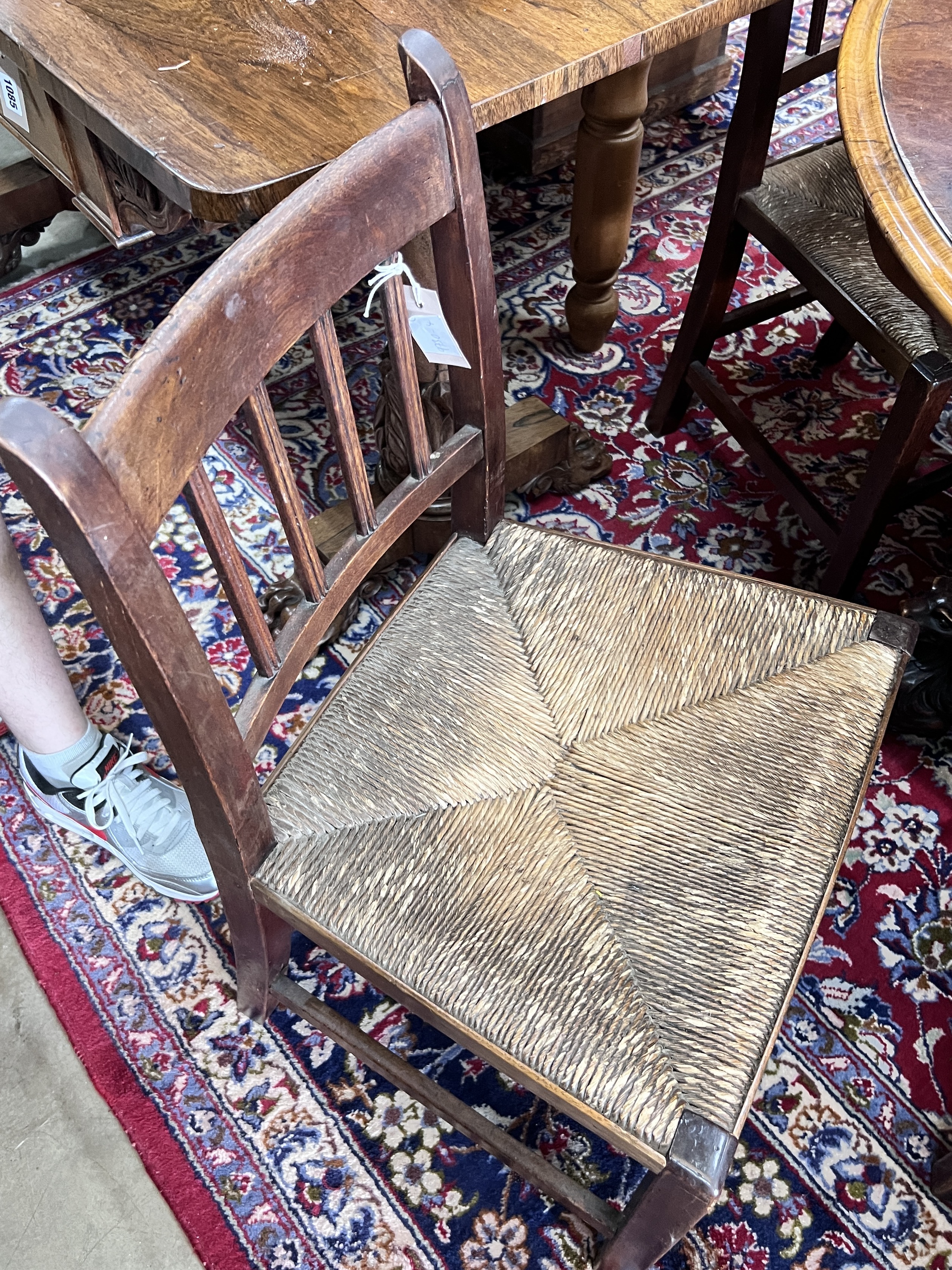 A set of six 19th century provincial mahogany rush seat dining chairs